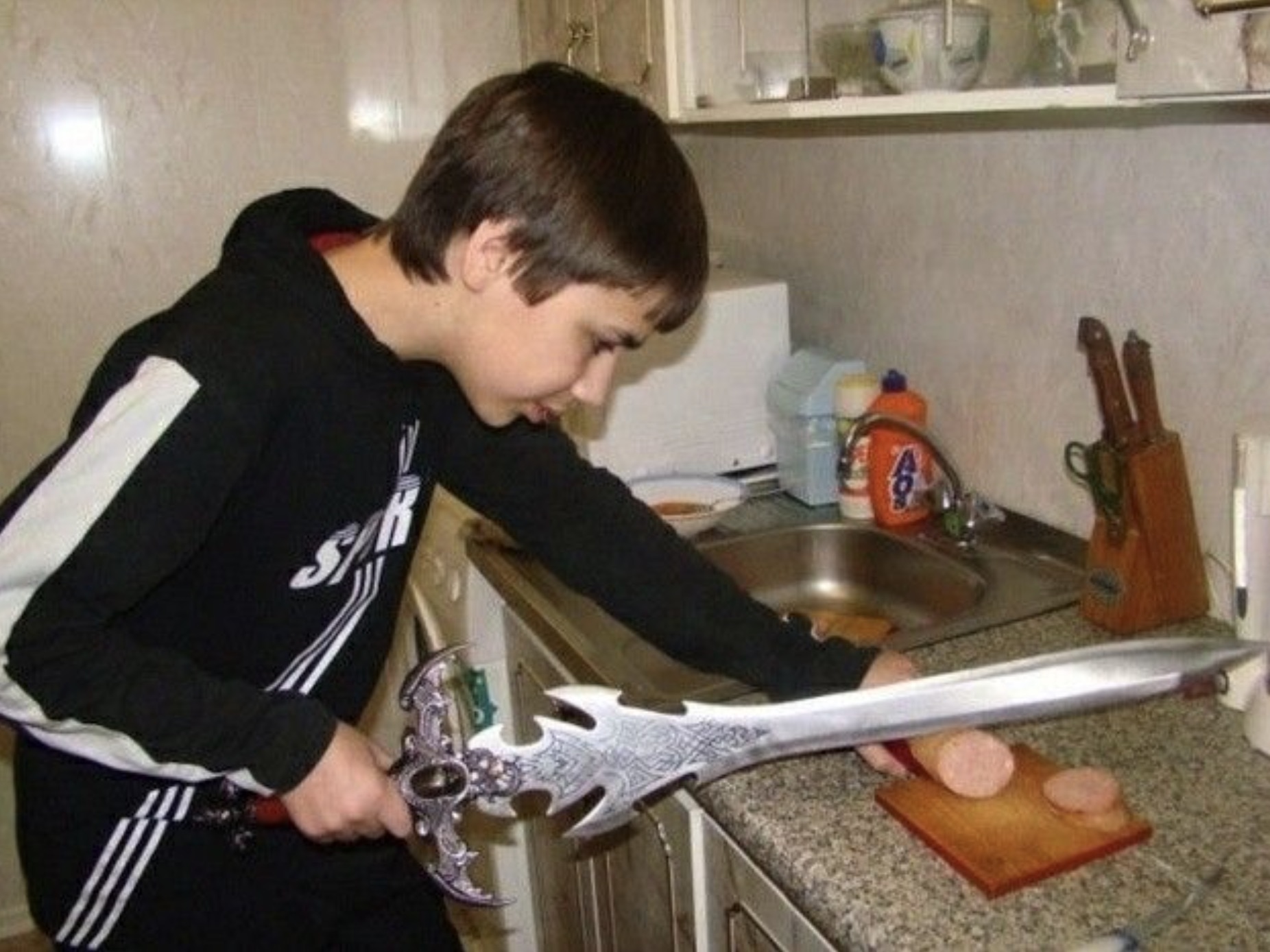 cutting sausage with sword